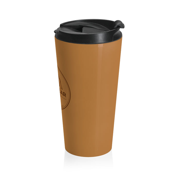 Brown travel mug with black lid on a white background