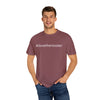Man wearing a maroon t-shirt with '#davetheroaster' text on a white background