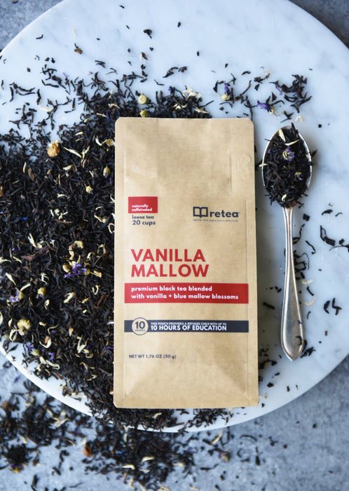 retea Vanilla Mallow premium black tea bag surrounded by loose leaf tea with vanilla and blue mallow blossoms. This pouch provides 10 hours of education.