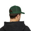 Person wearing a green cap and black hoodie on a white background