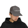 Man wearing a gray cap with 'Lone Bear Coffee' logo on a white background